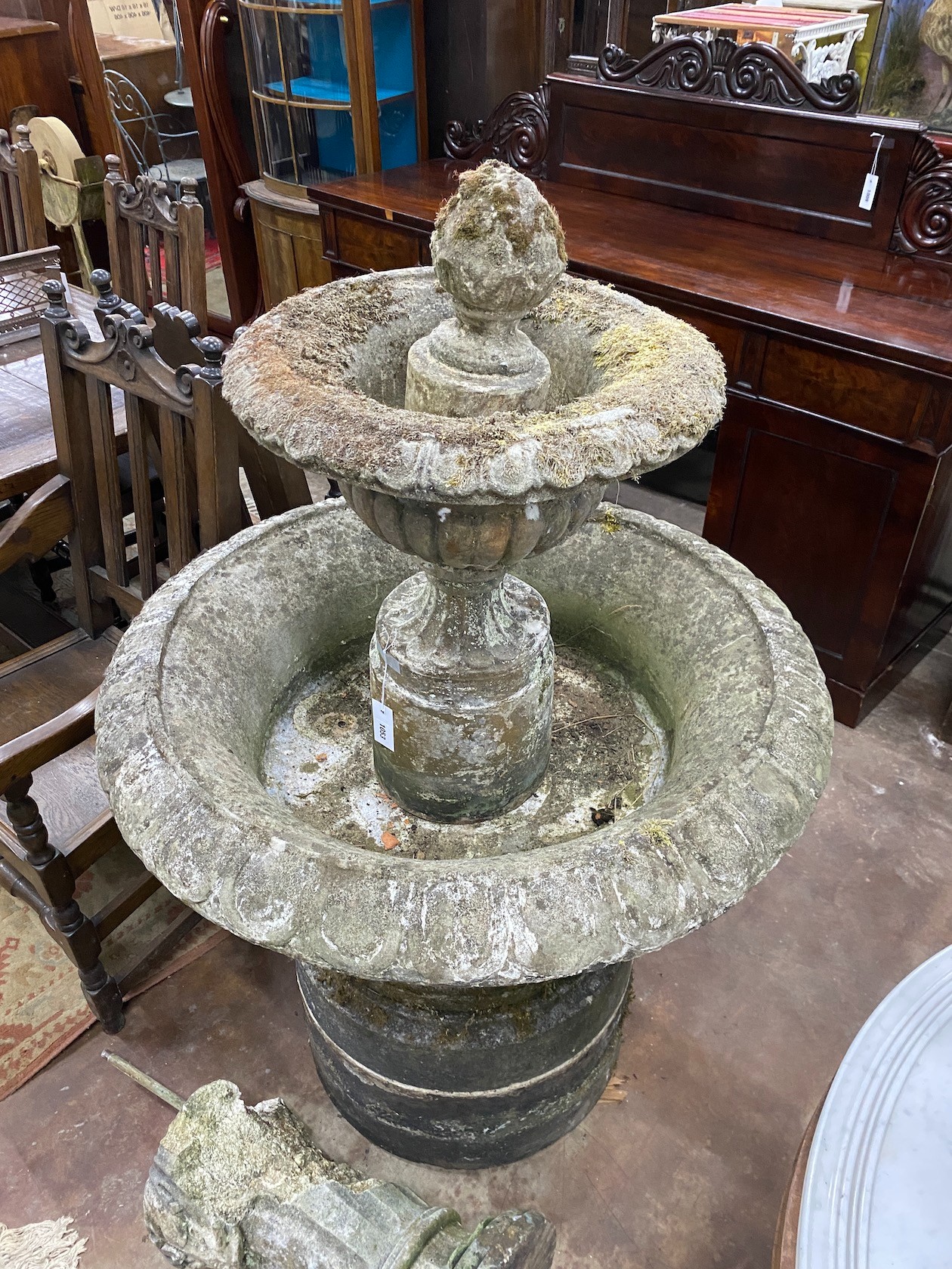 A large circular reconstituted stone garden fountain, diameter approx. 90cm. height 140cm, Provenance- the late Maureen Marchioness of Dufferin and Ava, Owl House Gardens, Lamberhurst, Kent
